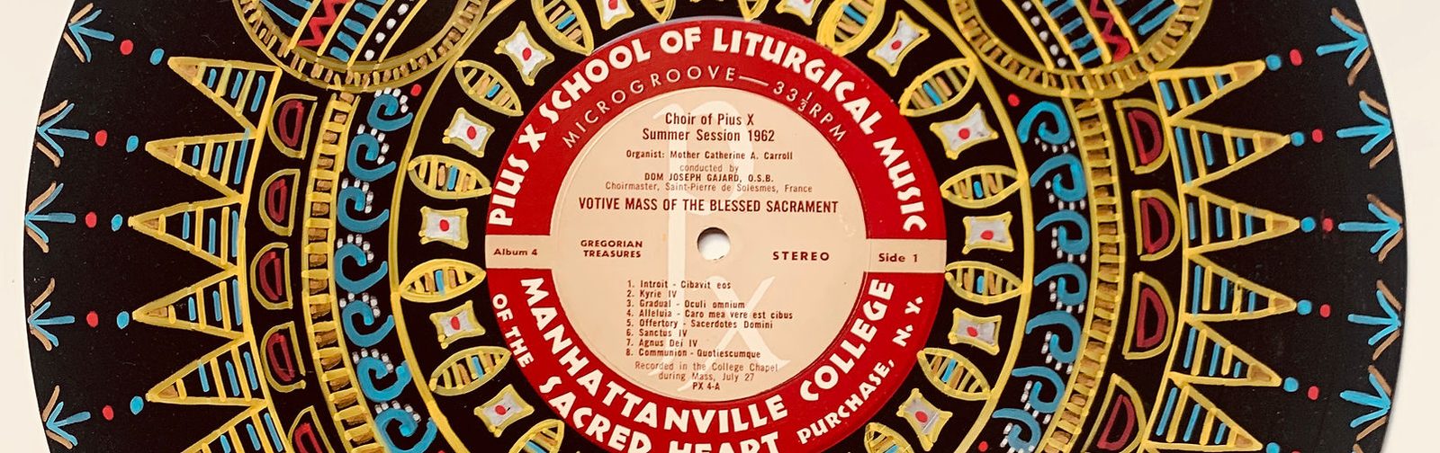 A vinyl record decorated with a painted pattern